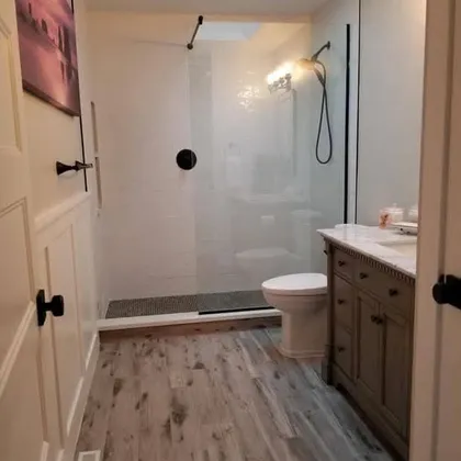 Compact bathroom with walk-in shower