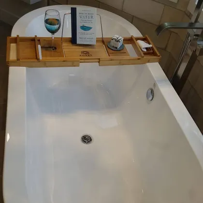 Modern bathroom sink with wood tray