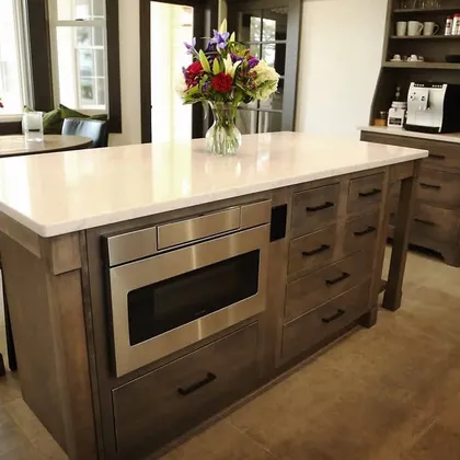 Kitchen island with built-in oven and seating