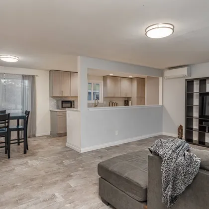 Open concept kitchen and dining area with island