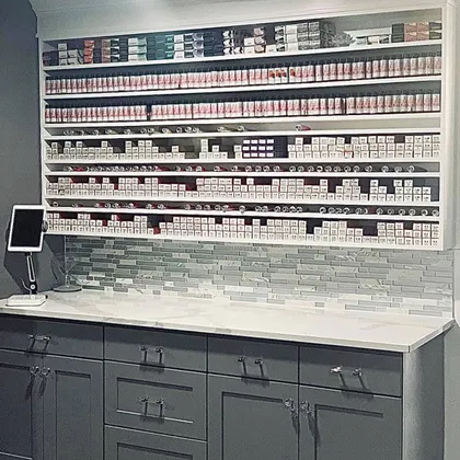 Salon product display with organized shelving and storage