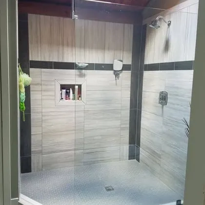 Walk-in shower with glass door